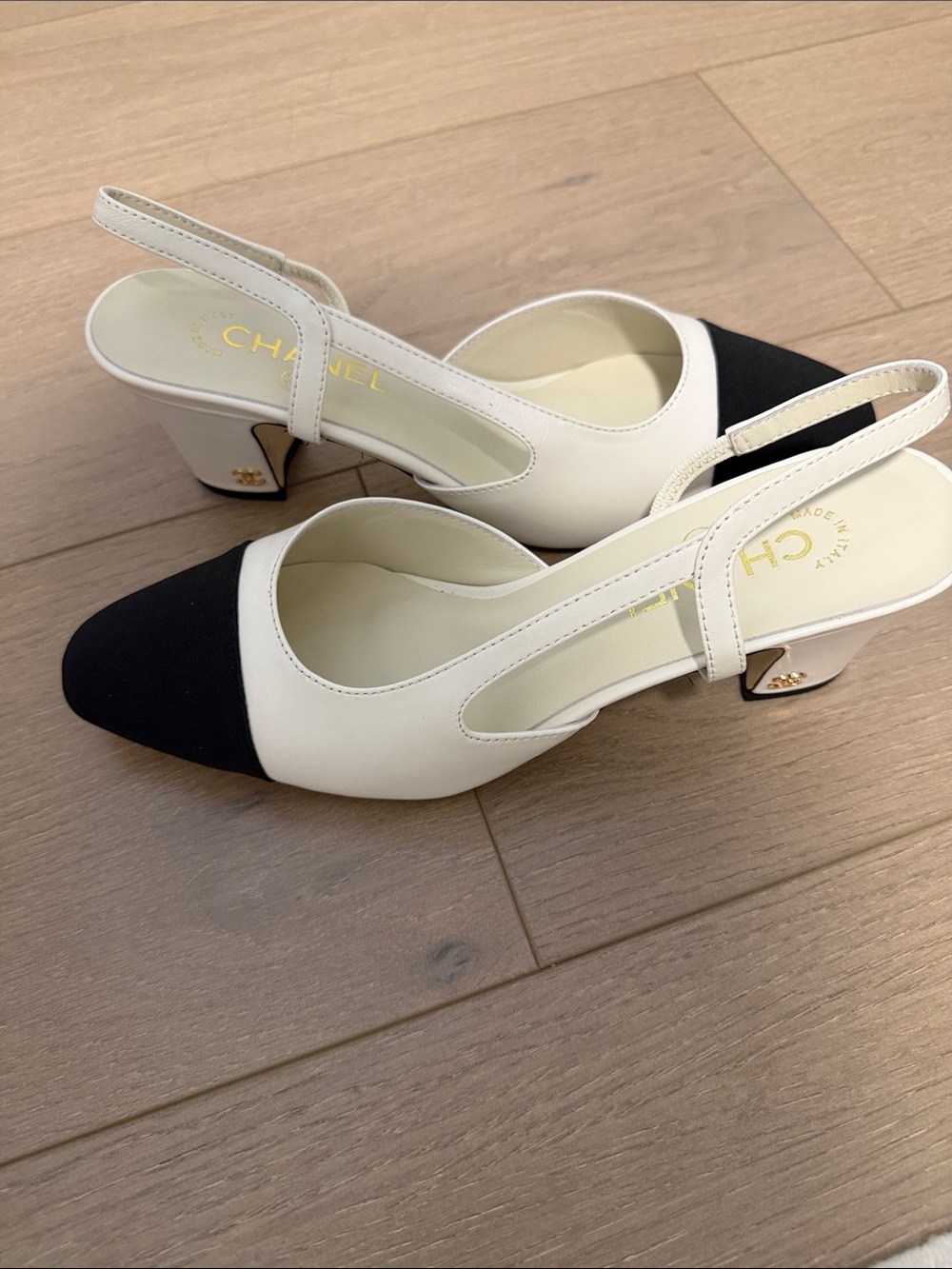 CHANEL Two-Tone Slingback Pumps in White and Black